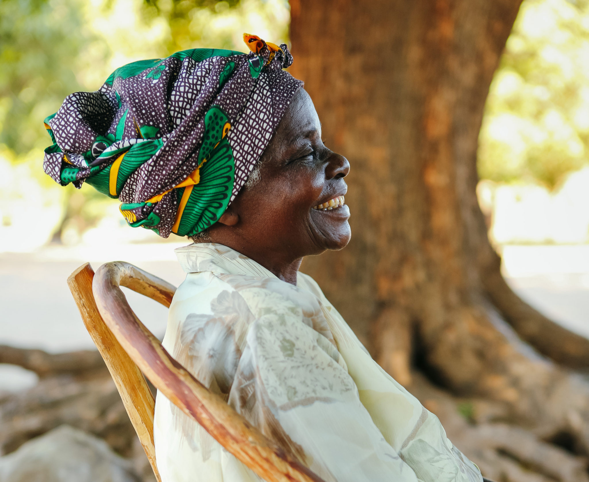 smiling older woman | Water and Sanitation Engineers | World Water Corps | Water For People