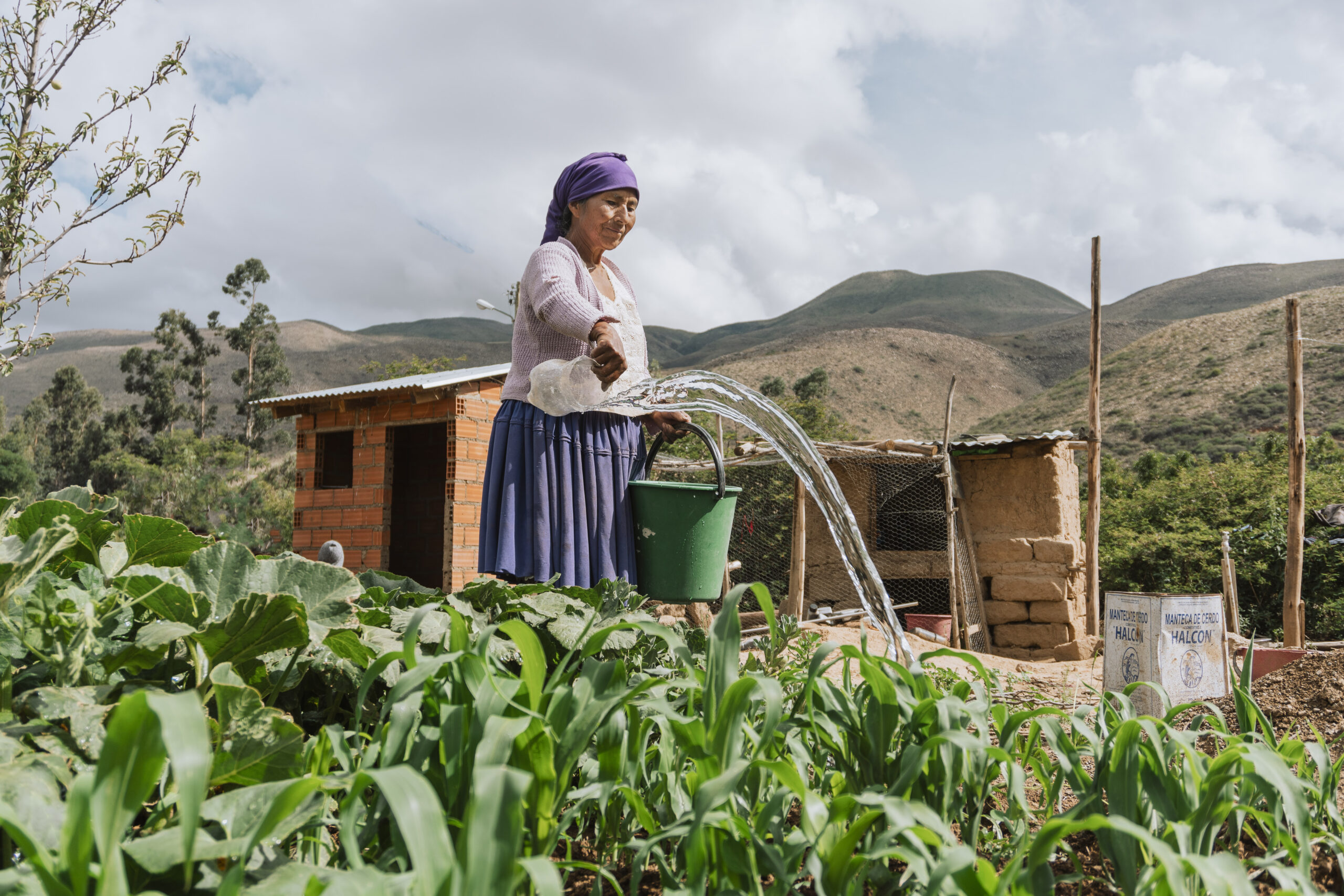 Arani_2023_Bolivia Dominga waters her garden in rural Arani, Bolivia.