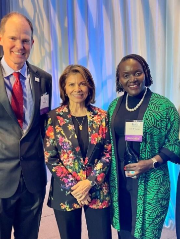 Water For People CEO Mark Duey, left, and Cate Nimanya, Africa Regional Director, right, with former President of Costa Rica Laura Chinchilla.