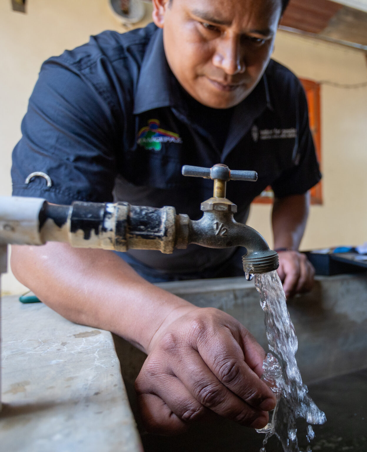Darwin getting a water sample