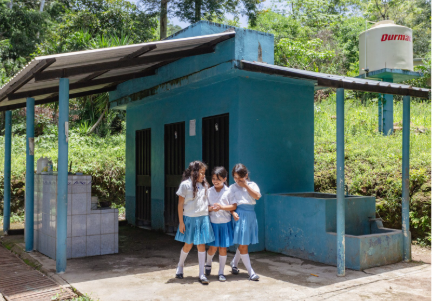 Students in Honduras using safe water in schools and sanitation facilities