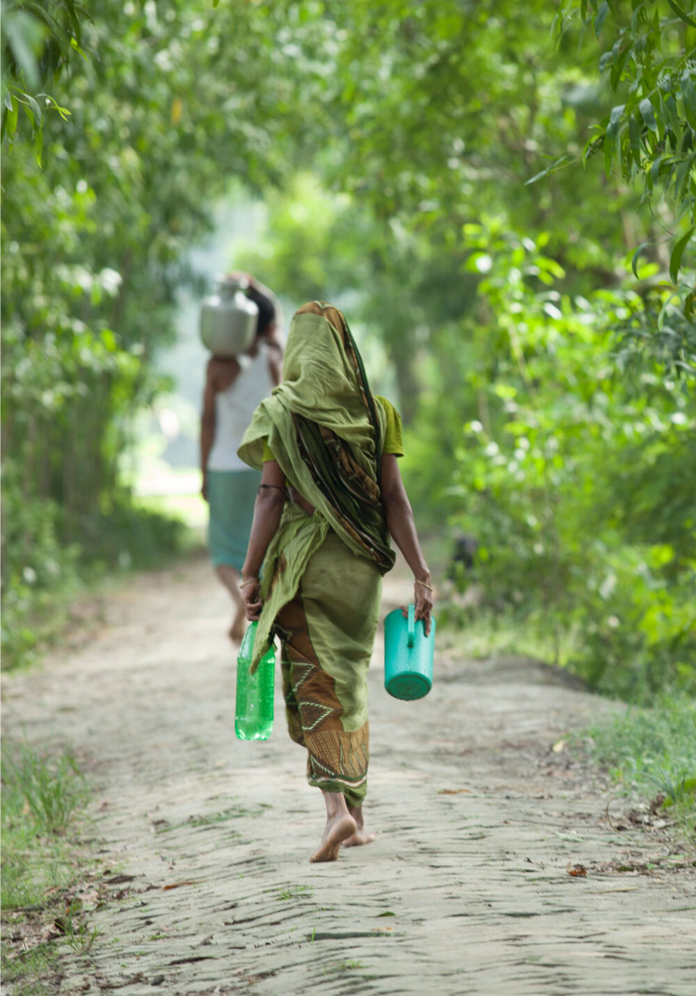 villagers carrying water | Support Clean Water | Get Involved | Clean Water in India | Where We Work | Water For People