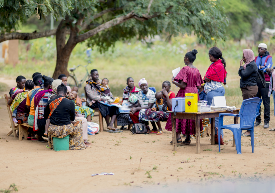 Mothers listen attentively during a Baby WASH sensitization session in Mpwapwa District, an initiative by Water For People in partnership with the Mpwapwa Local Government Authority.